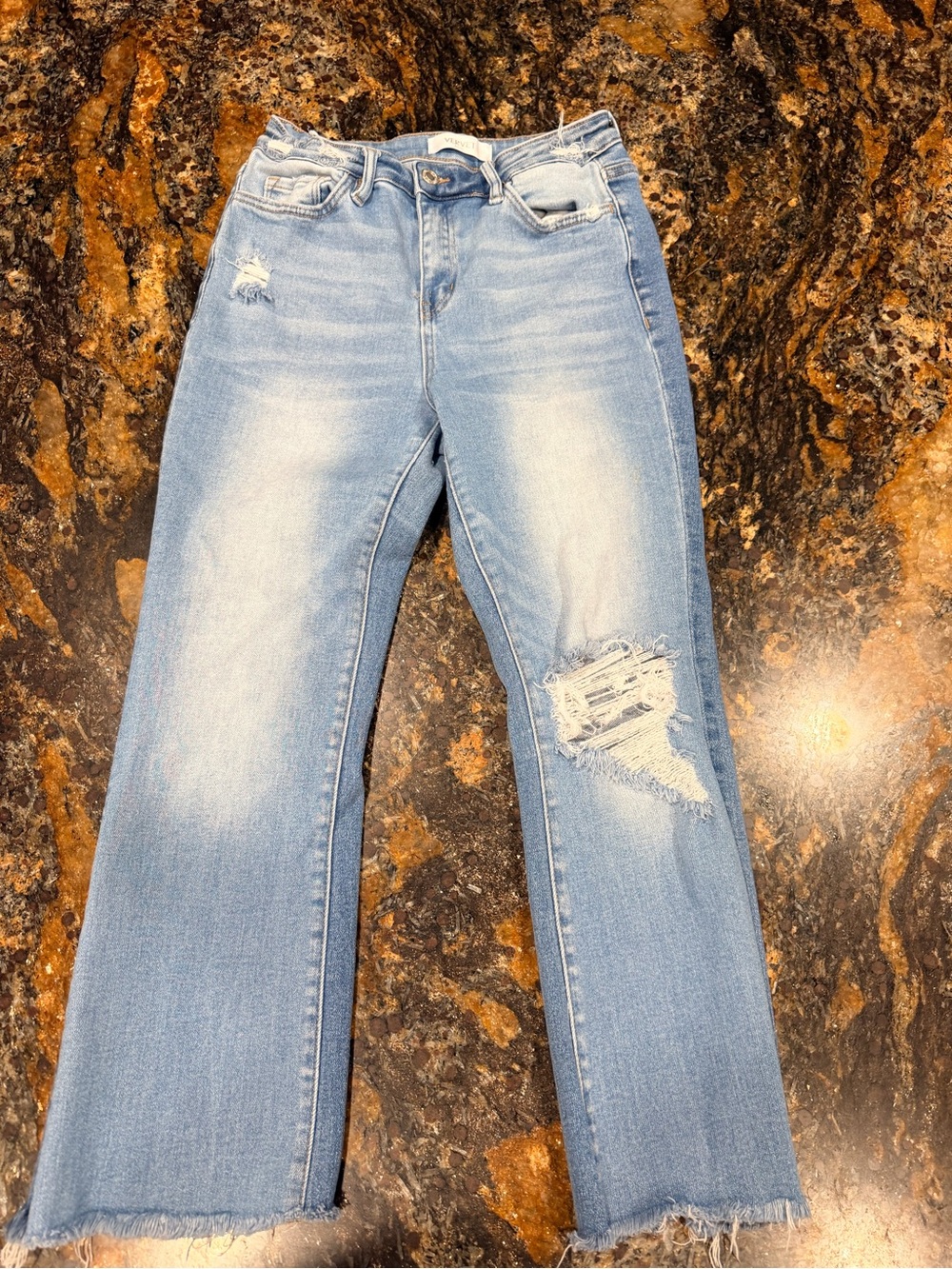 High-Rise Light Blue Distressed Cropped Jeans
